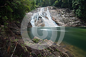 Tropical Rainforest Waterfall Swirling Currents, Undertows between submerge boulders