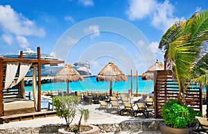 Tropical resort with cruise ships in port