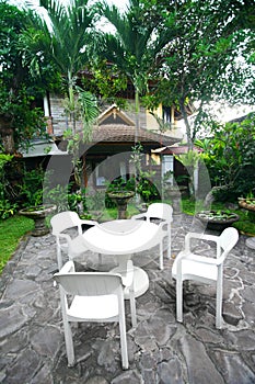 Tropical resort garden with furniture