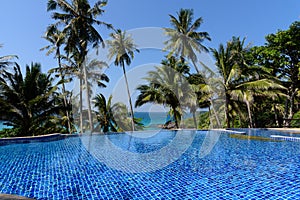 Tropical resort infinity  pool in Koh Koot Thailand