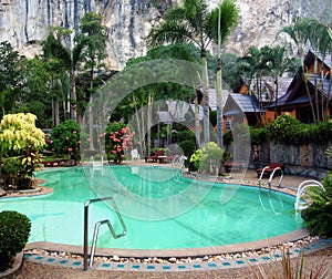Tropical resort with swiming pool photo