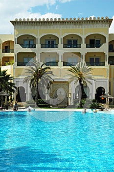 Tropical resort - swimming pool and hotel