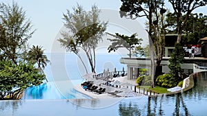 Tropical resort with swimming pool, sea view and restaurant