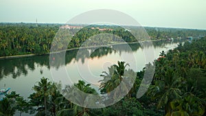 Tropical river with boats, ships and boaters in Southeast Asia