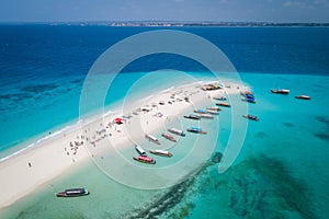 Tropical sand island with white sand beach, Zanzibar photo