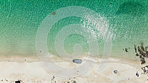 Tropical sandy beach and blue sea.