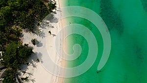 Tropical sandy beach and blue sea. Philippines