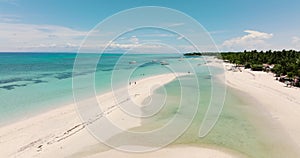 Tropical sandy beach and blue sea. Philippines