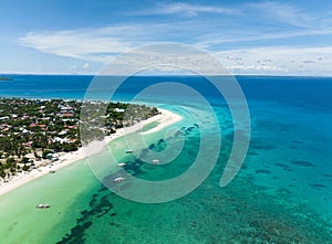 Tropical sandy beach and blue sea. Philippines