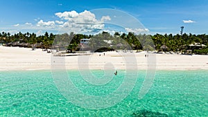 Tropical sandy beach and blue sea. Philippines