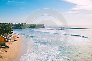 Tropical sandy beach and ocean waves in Bali