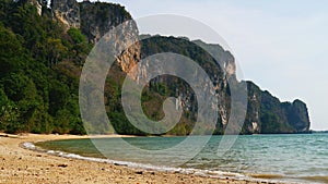 Tropical Sandy Beach Railay or Rai Leh West with Limestone Cliffs in the Background, Krabi Province, Thailand.