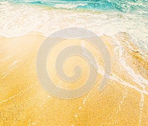 Tropical sandy beach and sea wave from above. Sand and water on tropical island top view. Exotic island summer holiday vacation