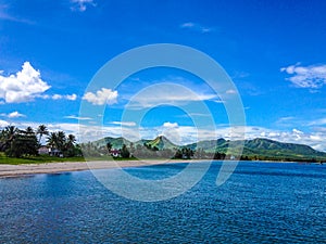 Tropical scenery with blue waters and sky