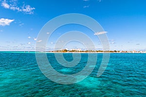 Tropical sea and Isla Mujeres coastline, Mexico