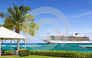 Tropical sea shore and cruise ship