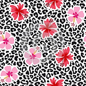 Tropical seamless background with hibiscus flowers and leopard pattern. Exotic animal and floral vector illustration.