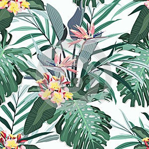 Tropical seamless pattern. Exotic flowers and leaves in vintage colors background.