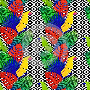 Tropical seamless pattern with exotic vivid leaves on black and white tribal background. Monstera, palm, banana leaves