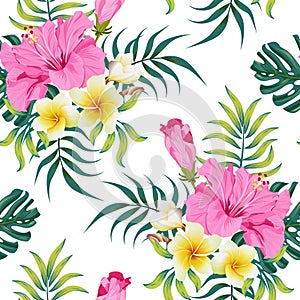 Tropical seamless pattern with pink hibiscus and plumeria flowers and green palm leaves and monstera leaves on a white background.
