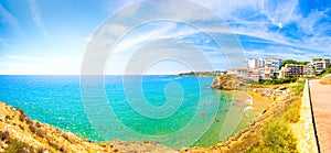 Tropical seascape. Clear blue sky above Costa Dorada seashore.