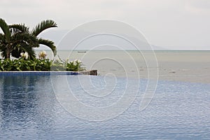 Tropical Seascape with swimming pool in foreground, Gulf of Thailand