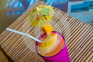 Tropical shake, refreshment drink in glass on tropical