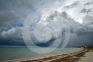 Tropical storm, hurricane over the Gulf of Mexico, black clouds over the ocean, Caribbean Sea