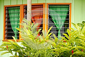 Tropical style window of a house in Neiafu town, Vavau island, T