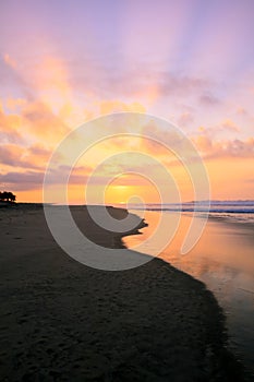 Tropical Sunrise over Pacific Ocean Sandy Beach in Mexico