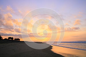 Tropical Sunrise over Pacific Ocean Sandy Beach in Mexico