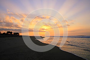 Tropical Sunrise over Pacific Ocean Sandy Beach in Mexico