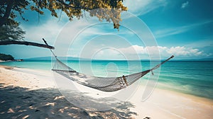 Tropical sunset beach and sky background as exotic summer landscape with beach swing or hammock and white sand and calm sea beach