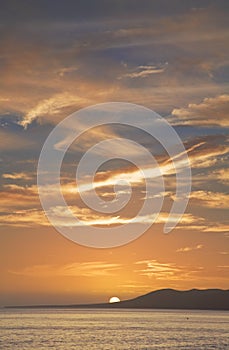 Tropical sunset over ocean