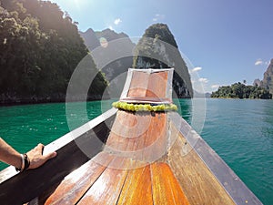 Tropical Thai jungle lake Cheo lan wood boat, wild mountains nature national park ship yacht rocks