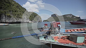 Tropical Thai jungle lake Cheo lan wood boat, wild mountains nature national park ship yacht rocks motor