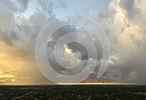 Tropical thunderstorm precipitation falling down on Florida town. Rain shower in summer photo