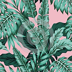 Tropical leaves green seamless pink background photo
