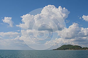 Tropical view of sea with clouds and blue sky at Chao Lao Beach, Chanthaburi Province.