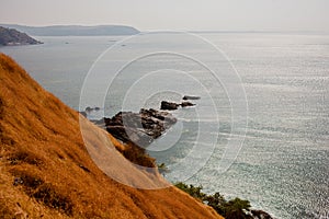 Tropical view to the ocean, beautiful hilly coastline in Gokarna, Karnataka, India