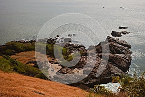 Tropical view to the ocean, beautiful hilly coastline in Gokarna, Karnataka, India