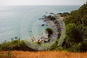 Tropical view to the ocean, beautiful hilly coastline in Gokarna, Karnataka, India