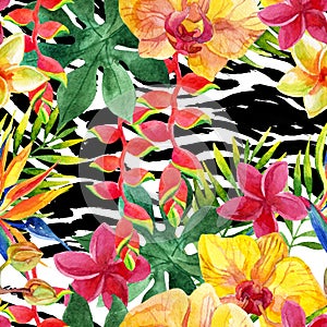 Tropical watercolor flowers and leaves on animal print