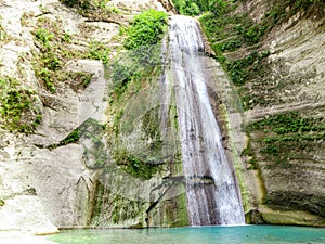 Tropical Waterfall in the jungle in Dao Falls in Cebu Island, Philippines