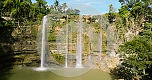 A tropical waterfall in a mountain canyon.