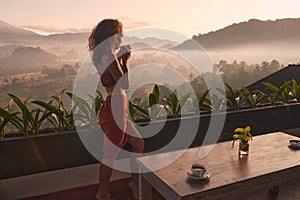 Tropical Woman Drink Tea. Beautiful Lady Drinking Coffee At Terrace