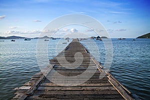 Tropical wooden pier in turquoise sea