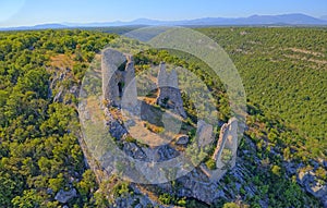 Trosenj fortress remains on the west side of mountain Promina in Croatia, aerial