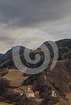 Trostburg above Weidbruck, Ponte Gardena in South Tirol. Fall Landscape of a Epic Castle in SÃÂ¼dtirol, in the middle of the Alps. photo