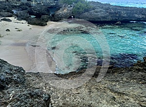 trou a man louis in the afternoon, blue sea water in a cove, grande terre, guadeloupe photo